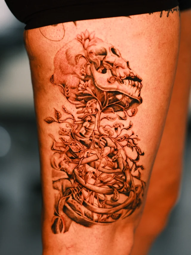 Skeletal serpent tattoo by Mason Hemphill